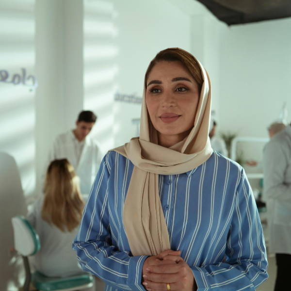 women standing in office with hijab